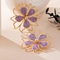 Detail of double-layer gold flower earrings with purple marbled enamel and golden beads - Light Purple Earrings / Light Purple