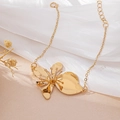 Elegant gold flower anklet for beach vacations featuring realistic floral charm design - Gold