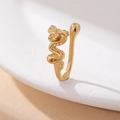 Minimalist golden dragon-shaped clip-on nose ring with intricate scale textures - Dragon