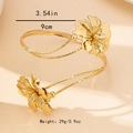 Detail view of golden floral arm cuff featuring 9cm diameter and 29g weight measurements - Arm Cuff (S450)