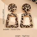 Detail view of bohemian leopard print earrings showing dimensions 7.5cm by 3.5cm - Geometric Drop Style (E0160) / Gold Leopard Print