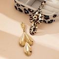Three-tier teardrop earrings with trendy leopard print and polished gold finish - Gold