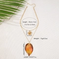 Detail view of double-layer necklace with golden flower and leaf pendant size specifications - Gradient Enamel Flower and Leaf Style (X1057)