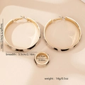 Detailed view of large gold-tone leopard print hoop earrings and ring jewelry set - Leopard Print (E1167)