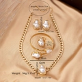 Vue détaillée d'une parure de perles baroques sur soie dorée avec dimensions - Or