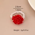 Détails de la bague rose rouge et perles montrant le diamètre 2,6cm et poids 2g - Rouge