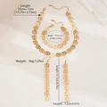 Detail view of gold Greek Key jewelry set showing necklace, bracelet and long earrings - Gold