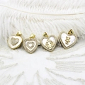 Detail of 18K gold heart charms with mother of pearl and bear inlay on white lace - White Shell Double Layer Heart (16.8x18mm)