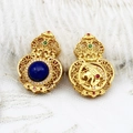 Macro detail of golden hollow gourd pendant with blue gemstone and phoenix carving - Lapis Lazuli Gourd 18.5*26.3mm