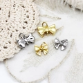 Detailed view of 18k gold plated bow pendants with zircon accents for DIY jewelry - Top Bottom Hanging Bowknot / 8.8*13.6mm / Gold