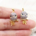Two-tone micro-pave bird pendant with blue eyes and gold bow for jewelry making - Bird Shape / 22x11mm (1 Piece) / Gold and Silver Two-tone