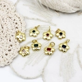Macro detail of colorful flower pendants with faux gemstone centers for jewelry making - White Rhinestone Round Flower 9*11mm