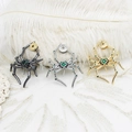 Vintage 18K gold plated spider brooches in gold, silver and black with green gemstones - White Gold