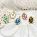 Detail view of oval flower pendants with 18K gold plated frames and zircon stones - 12*20mm / Tulip-Shell White