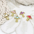 Macro shot of colorful mushroom enamel charms for DIY jewelry making with gold-plated finish - White Mushroom