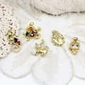 Macro view of gold-plated sea animal charms with colorful cubic zirconia for DIY jewelry - Colorful Zirconia Seahorse