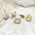 Detailed view of micro-paved sea shell and crab pendants for DIY jewelry making - Full Zirconia Crab