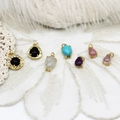 Set of seven colorful geometric stone pendants with gold plated frames and zircon accents - Black Zircon Round Style