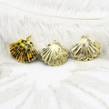 Detailed close-up of shell pendants with leopard enamel and zircon inlays for DIY jewelry - Black And Orange Pattern Scallop