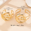 Dettaglio dei bracciali a spirale dorati con finitura in metallo lucido e dimensioni - Set Bracciale da Braccio e Bracciale a Spirale Oro (S324)