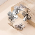 Silver vintage floral open cuff bracelet with layered flower petals on a stone base - Silver