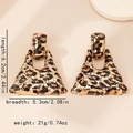 Detail view of large leopard print earrings with size dimensions 6.2cm by 5.3cm - Leopard Geometric Triangle Style (E1083)