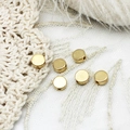 Close-up of 18K gold plated matte round spacer beads with side holes for DIY jewelry - Large Round (5.8*5.8mm)