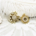 Detail of 18K gold plated celestial charm with micro-set zircon sun and moon motifs - Sun And Moon Style