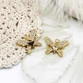 Detailed view of 18K gold plated butterfly pendants with micro-pave zircons and heart stones - Black Zircon Butterfly
