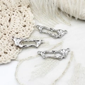 Close-up of silver irregular lava-style hollow charms for DIY jewelry making - 9.8*28.8mm / Hollow Quadrilateral (G0362)