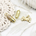 Kreative Goldkapsel- und Game-Controller-Anhänger für DIY-Halsketten Schmuckherstellung - Strass-Pille (6.6*21.3mm)