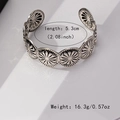 Detailed view of vintage silver bangle with sunburst pattern showing 5.3cm diameter size - Retro Silver (Sunburst Pattern)