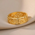 Macro shot of vintage gold-plated ring featuring intricate hollow vine scroll carvings - Gold / Vintage Scroll Filigree (JZ4883)
