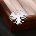 Polished silver eagle brooch with three stars displayed on a premium jewelry box - Spread Wing Eagle With Stars / Silver