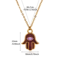 Detailed size specifications of golden Hamsa Hand pendant with purple evil eye charm - Purple