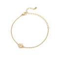 Detailed view of the 18k gold plated stainless steel sun pendant and lobster clasp - Gold
