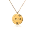 Macro shot of 18K gold plated round pendant engraved with lucky numbers 11:11 and stars - Decorated Round Plate 11:11 Style (G264154)