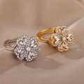 Rotating zircon flower rings in silver and gold plating on premium satin fabric - Platinum / Pave Flower Cluster Style (4)