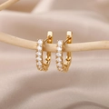 Close-up of gold U-shaped earrings with micro-paved zircons on elegant silk background - Micro-inlaid Half Hoop U-Shape Style (E2301G-12) / 18K Gold / Gold
