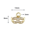 18K gold plated mask pendant with micro-paved zircons measuring 13mm by 8mm - Mask