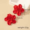 Macro detail of large matte red floral earrings showing 5.5cm size and 3D petal texture - Burgundy