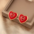 Elegantes pendientes de corazón dorados con esmalte rojo y piedra central de rubí - Rojo