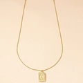 Golden square pendant necklace with embossed letter K on a sleek snake chain - Letter K
