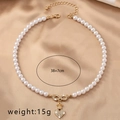 Detail view of heart pearl necklace showing 38+7cm length and crown pendant details - Heart (X210)