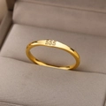 Macro shot of gold stainless steel ring with 555 numeric engraving on a jewelry box - Angel Number 555 (JZ03-L8-15)