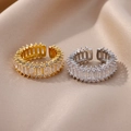 Detail of adjustable gold and silver rings with rectangular zircon stones on silk fabric - Micro-set Pave Zirconia Style (4415) / Platinum