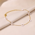 Detail of 18K gold stainless steel anklet with white pearl flowers on beige satin - Gold White Artificial Pearl Flower Style (HJ471G)