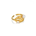 Golden lip shaped ring with white pearl and heart zircon detail on a minimalist background - Lip Shape Heart Clear Zirconia (JZ7262-1)