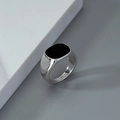 Minimalist silver signet ring for men with a polished black oval center stone in a modern style - Silver