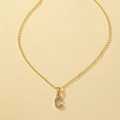 Macro detail of golden necklace featuring a letter C pendant set with sparkling zircons - Letter C Style (X012-Letter C)